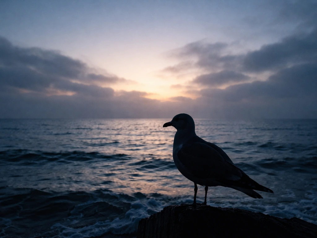 Single gull silhouette over calm waves at dawn, with sky clouds suggesting an awakening.